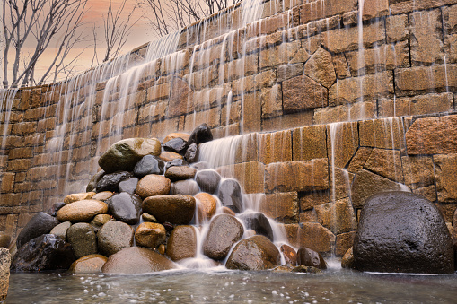 Long exposure photo of waterfall in public park