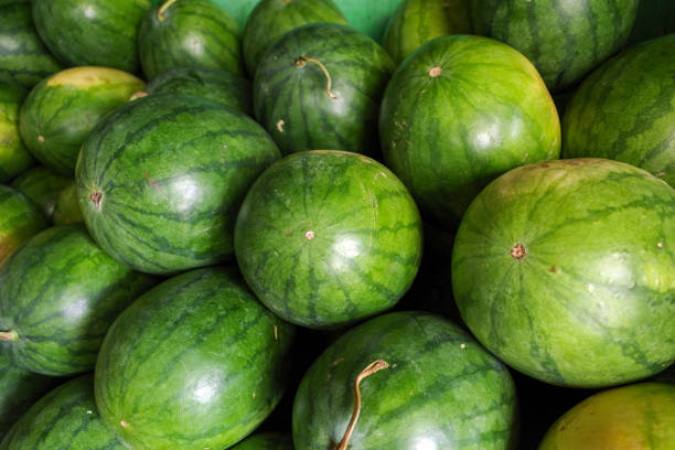 Lagos, Nigeria. Watermelons for sale at street market.