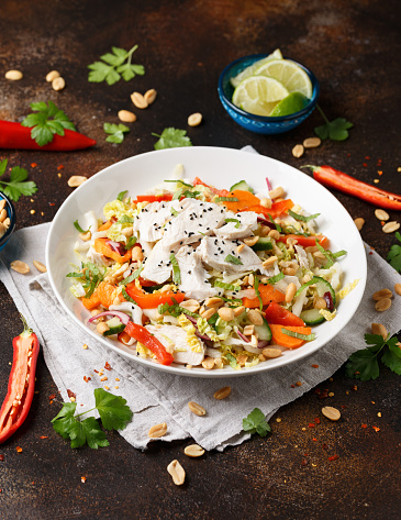 Healthy Vietnamese Chicken Salad with vegetables and peanuts.