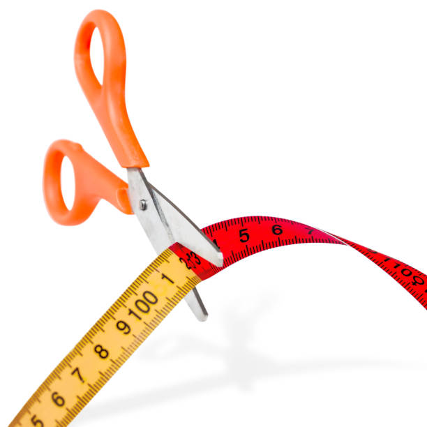 istock Scissors for sewing and measuring tape isolated on white background. 2057816312