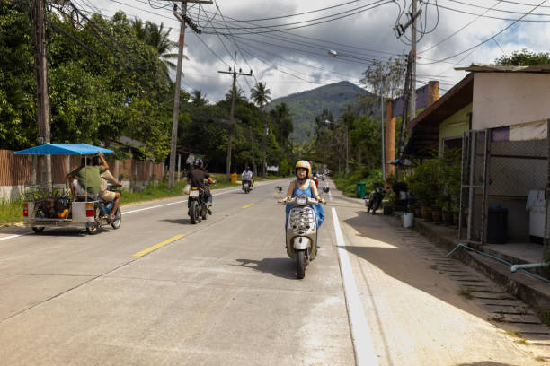 istock Woman riding a scooter 2057849347