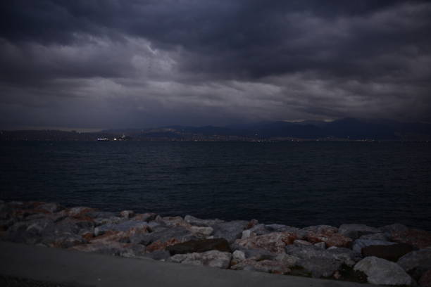 Free Stock Photo of Rocky Waterfront Under Cloudy Sky | Download Free ...