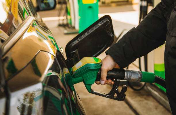 istock Refueling Car at Gas Station: Cropped View 2057874020