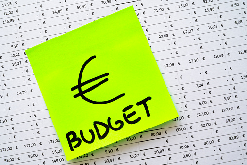 Table with budget, expenses, revenues and ticket with Euro symbol.