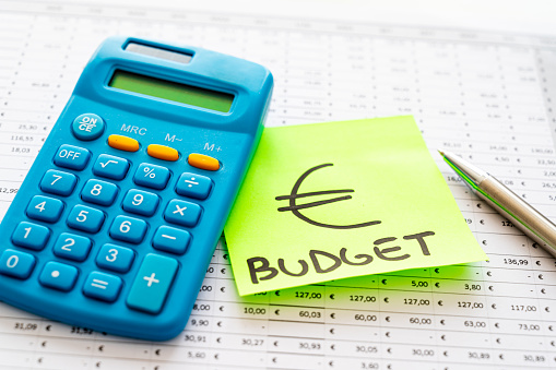 Table with budget, expenses, revenues and ticket with Euro symbol.