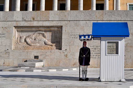 Athens, Greece - December 18, 2023: Guards called Evzone in traditional uniform in front of the parliament building