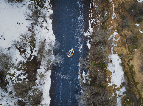 Rafting on the Jagala River in winter, aerial photo from a drone. High quality photo