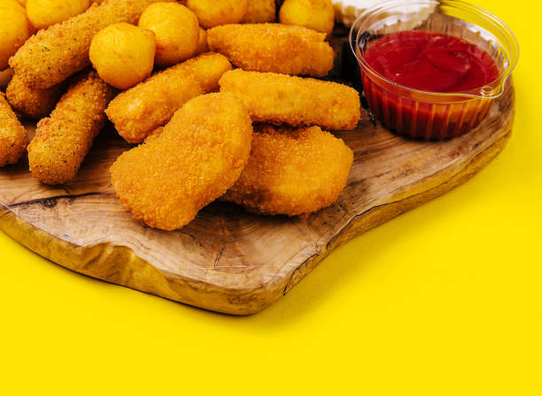 istock nuggets and cheese balls with sauces 2057924232