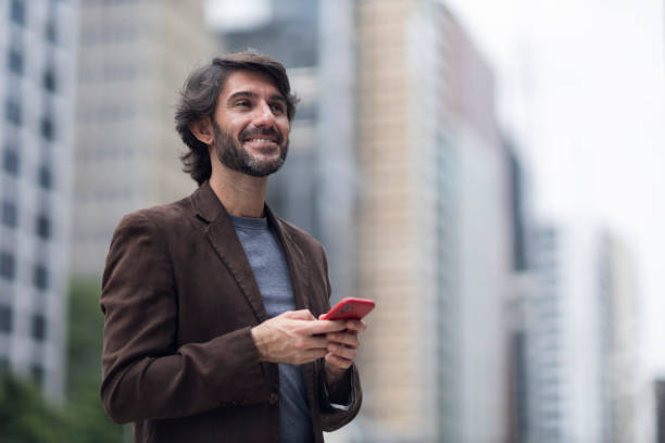 istock View of a young man with smartphone at daytime 2057931304