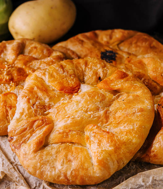 istock Cooking traditional pies with potatoes close up 2057937857