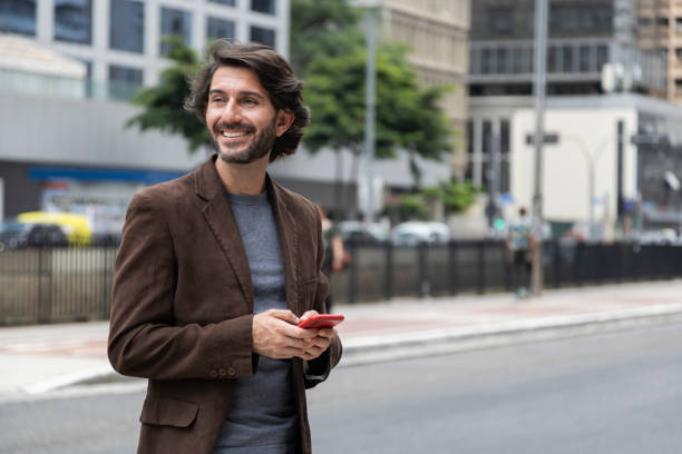 istock View of a young man with smartphone at daytime 2057944351