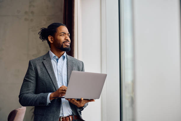 istock African American businessman using laptop in the office 2057970894