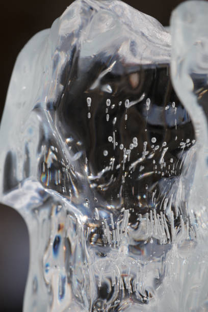 istock Close up of clear natural ice block with bubbles 2057995199