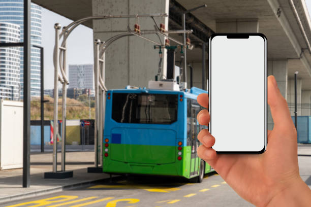 istock Electric bus at a stop is charged by pantograph. Clean mobility. 2058001189