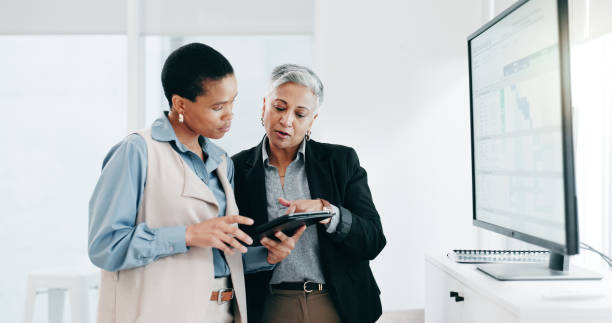 istock Women, team and computer screen or tablet for spreadsheet, business calendar or project timeline management. Professional manager or people on digital technology for marketing strategy and solution 2058010715