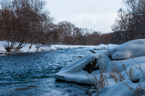 Chubetsu River in winter, photographed in Asahikawa, Hokkaido, Japan