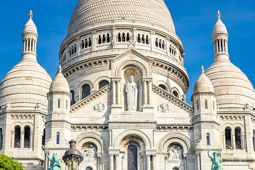 Paris, France - September 10, 2023 : Close up on the facade of the Basilica of the Sacred Heart in Montmartre in Paris, France