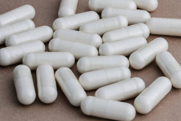 istock A stack of supplement capsules, dietary supplements, vitamin tablet, nutritional supplements in capsule form. 2058078644