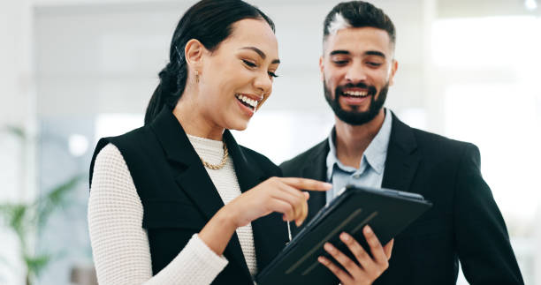 istock Teamwork, tablet and business people in office for advice, project management and planning review. Man, woman and happy corporate employees with digital technology for feedback, collaboration or talk 2058126291