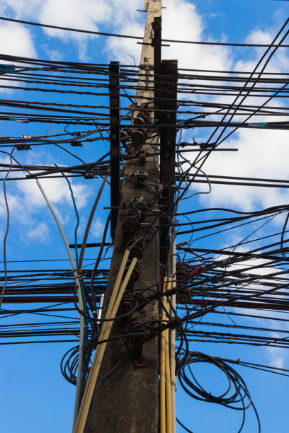 istock Cables and wires on electric pole 2058164510