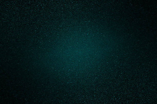 istock Dark blue green shiny glitter abstract background with space. Twinkling glow stars effect. Like outer space, night sky, universe. Rusty, rough surface, grain. 2058177414