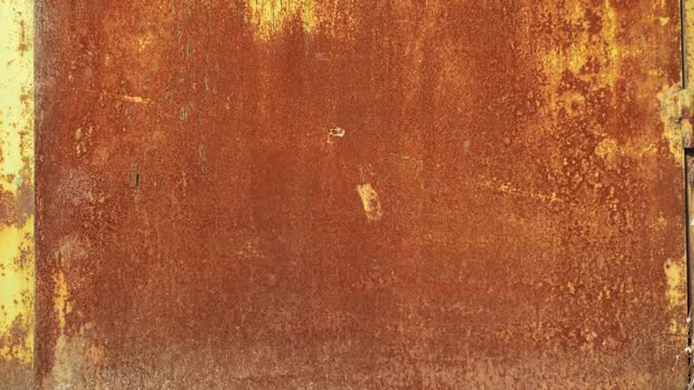 Rusty metal background texture. Grunge rusty orange brown metal