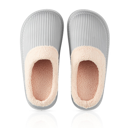 Top View Of Slippers Over White Background