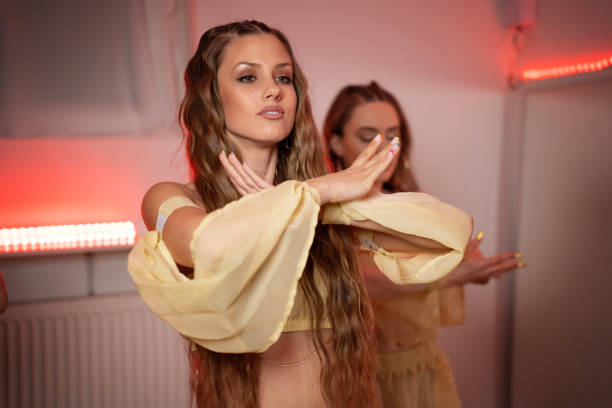 istock Belly dancers in studio rehearsing choreography 2058242901