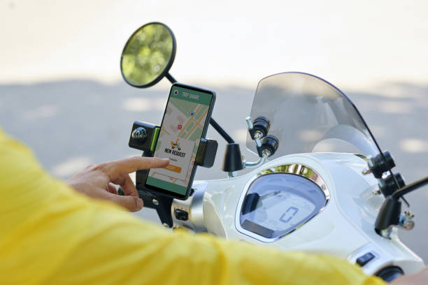 istock Motorbike Taxi Driver Accepting Request 2058257234