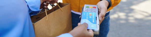 istock Customer Paying for Food Delivery 2058257765