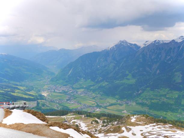 istock Spring Symphony in the Austrian Alps: Nature's Reawakening with Snow-Capped Peaks 2058265796