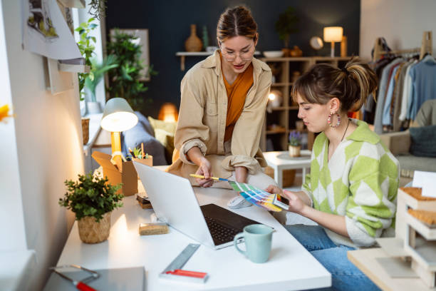 Two female designers working on a project together