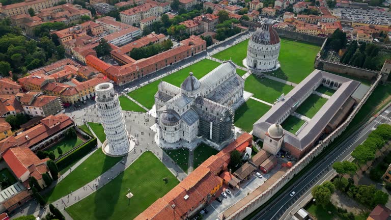 4K Aerial view Real time Footage of Leaning Tower of Pisa or Square of Miracles the Tower of Pisa, Italy, Tourist and Travel Destination