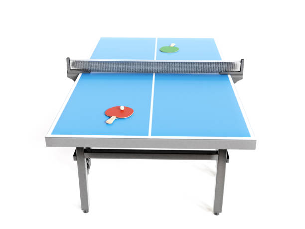 istock Blue ping-pong table with red and green paddles and ball 2058311663