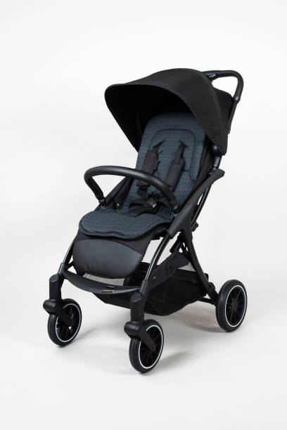 istock Black baby carriage on a white background 2058348155