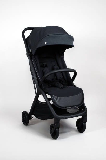 istock Black fabric baby carriage on white background 2058350279