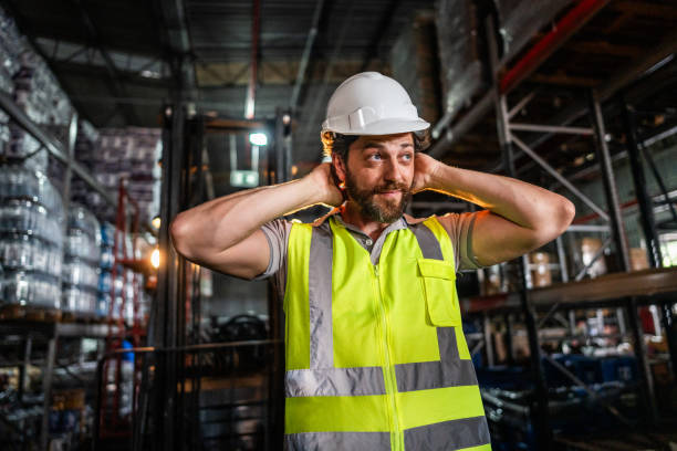 istock Mid adult man working at warehouse 2058373003
