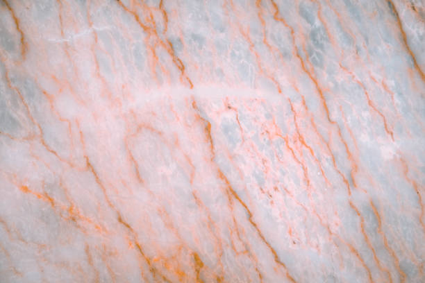 Detailed extreme closeup surface of decorative white orange marble