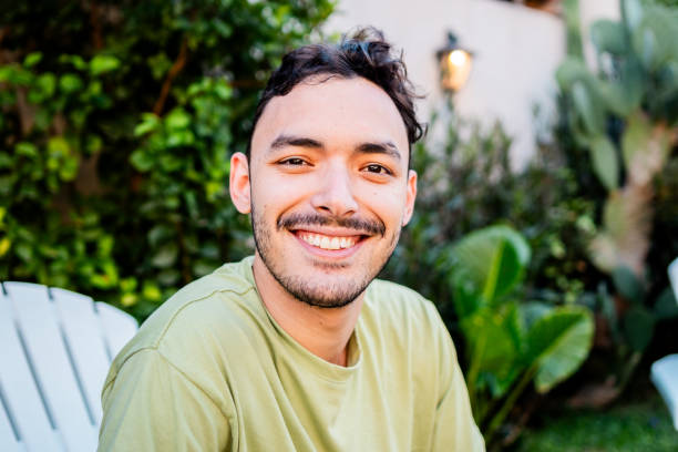istock Portrait of a young man in the backyard 2058390301