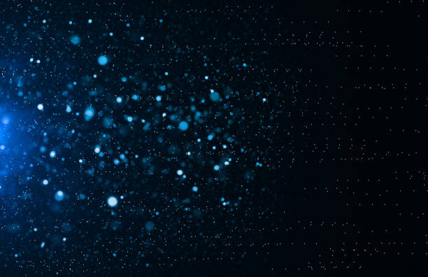 istock Dark blue background. Digital, abstract. Bokeh light lights effect background. Christmas glowing dust background. 2058395274