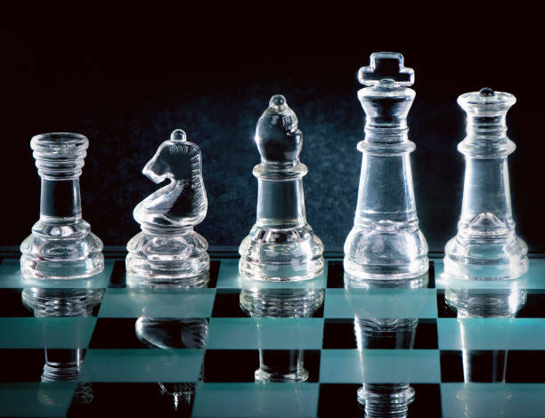 istock Glass chess is placed on black background 2058420069