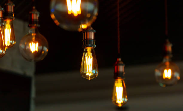istock Decorative antique edison style filament light bulbs hanging from ceiling 2058420626