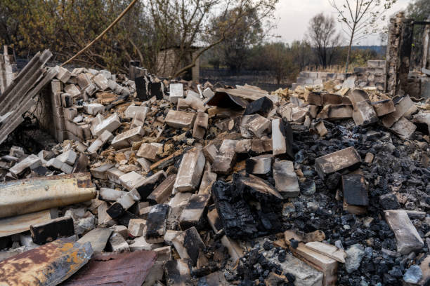 istock Pile of burnt bricks from a destroyed house after the fire 2058421207