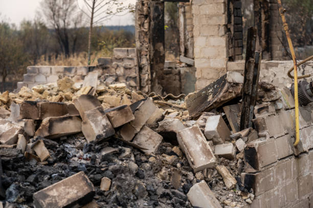 istock Pile of burnt bricks from a destroyed house after the fire 2058421217