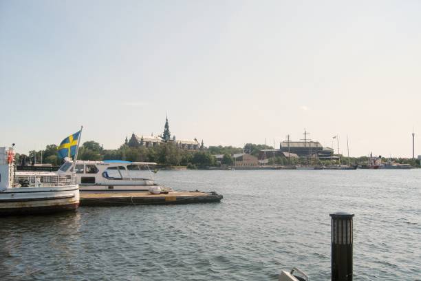 view of skeppsholmen island from waterfront in harbor. stockholm, sweden - august 19, 2008 - stockholm harbor sweden winter imagens e fotografias de stock