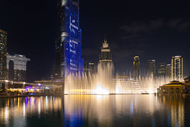 The Dubai Fountain - July 13, 2019,  Dubai, UAE. The Dubai Fountain in The Dubai Mall, world's largest choreographed fountain system set on the 30-acre at Burj Khalifa Lake