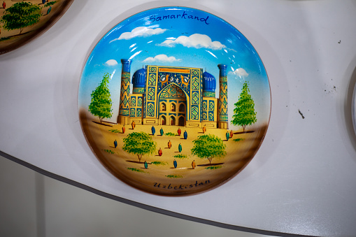 Uzbekistan, a traditional Uzbek plates in a display, handicraft items, passing from generation to generation, old crafting.