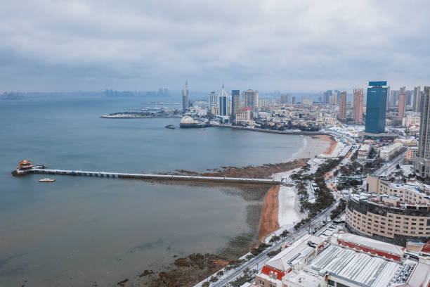istock Qingdao city building in snowing 2058580469
