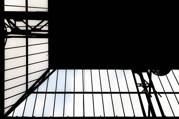 istock Low angle or down below view on abstract industrial architecture in silhouette 2058597398