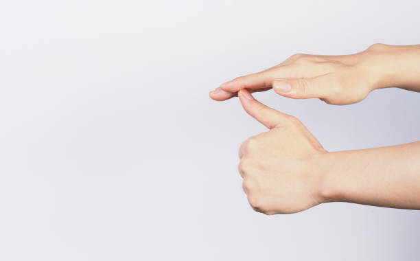 istock I feel you  hand sign on white background 2058601147